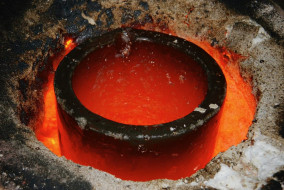 Heated crucible in kiln